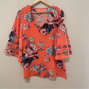 Coral floral top with bell sleeves. Size:xl